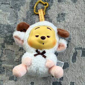 Miniso Winnie the Pooh plush pendant keychain or bag hook.